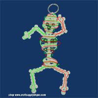 Cord threading pattern for beaded skeleton keychain.